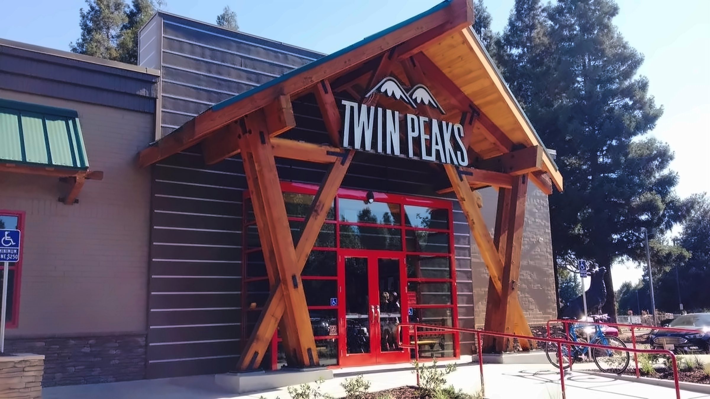 Restaurant entry with a heavy timber frame